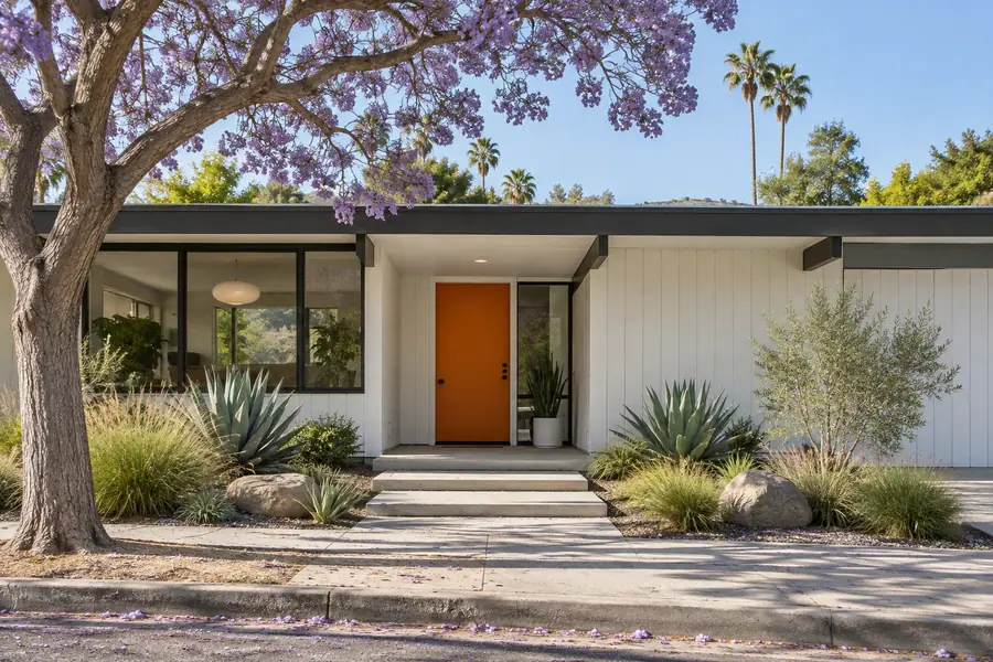 Freshly painted mid-century house in Los Angeles under a clear late-spring sky