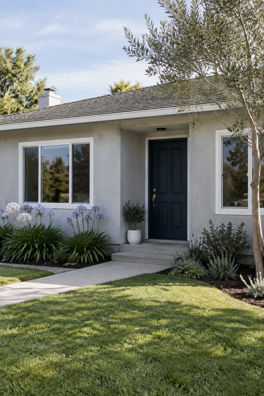 1950s Inglewood tract home with new dual-pane windows and a solid-core navy front door