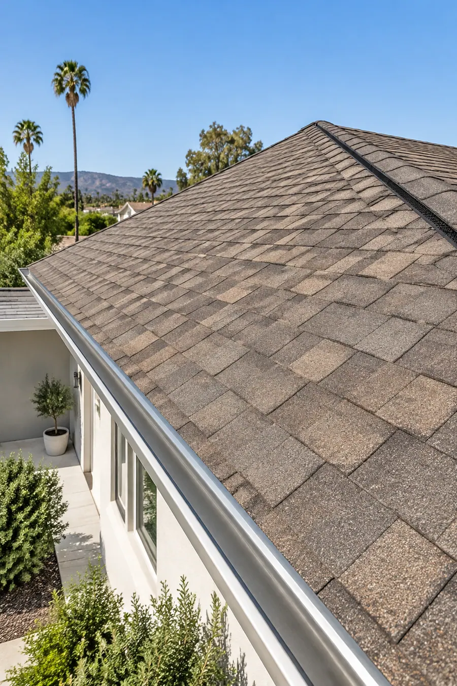 New architectural shingle roof with a ridge vent on a Los Angeles ranch house