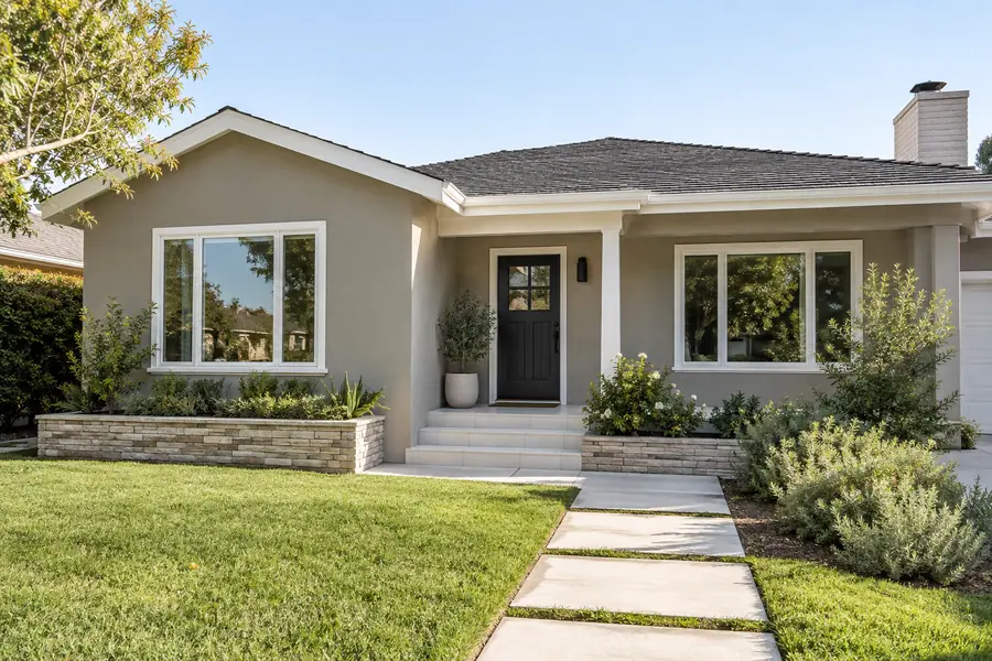 Valley ranch exterior design with dual-pane windows and fresh painted trim