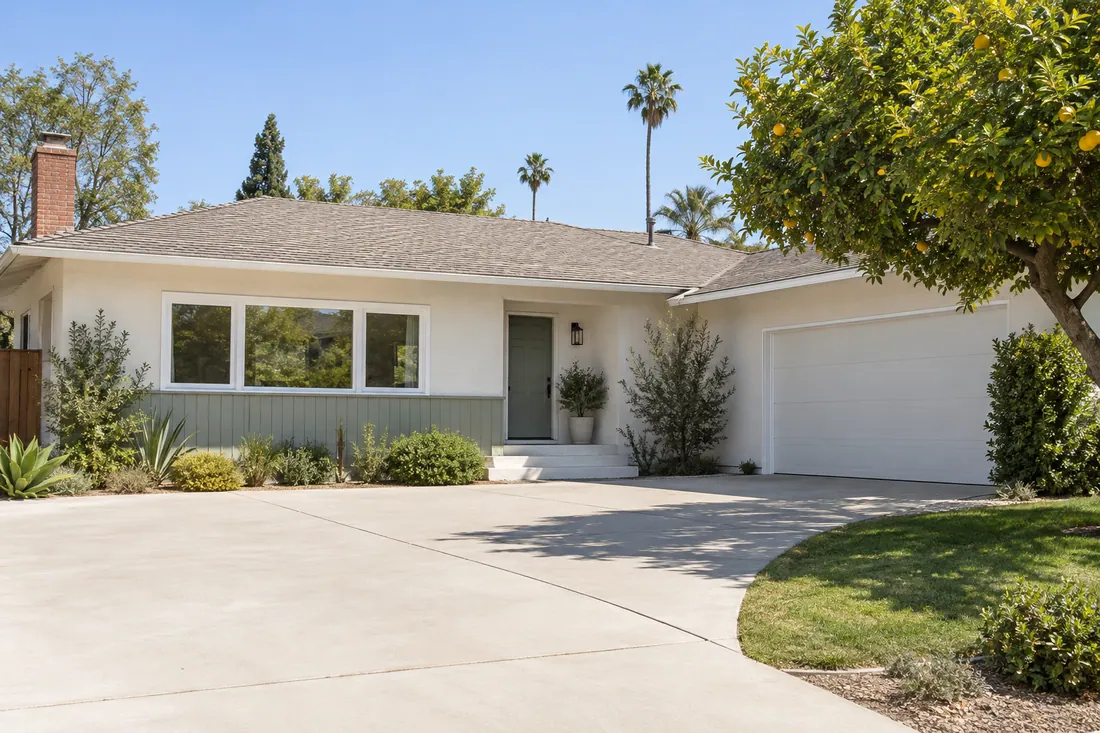 Valley ranch house in Los Angeles with stucco walls, wood trim and a low roof