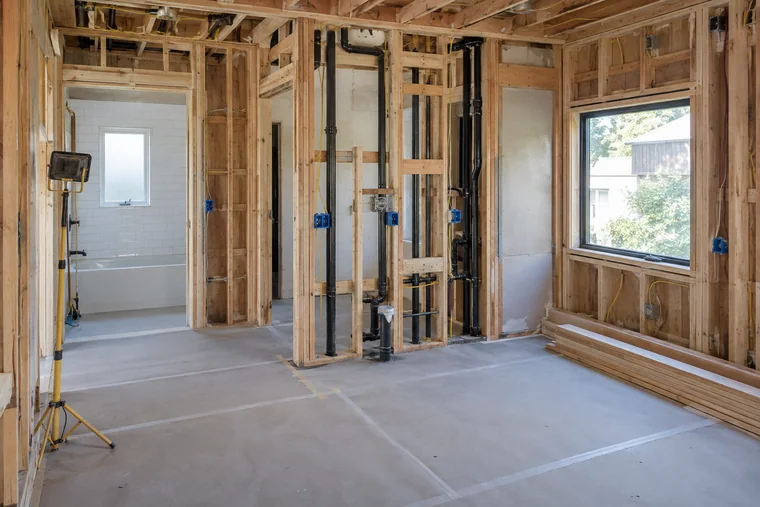 Remodel in the build phase with new framing, rough plumbing and electrical in open walls