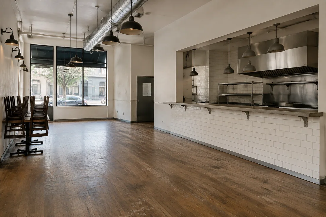 Vacant second-generation restaurant space in Los Angeles with an existing hood and an empty dining room